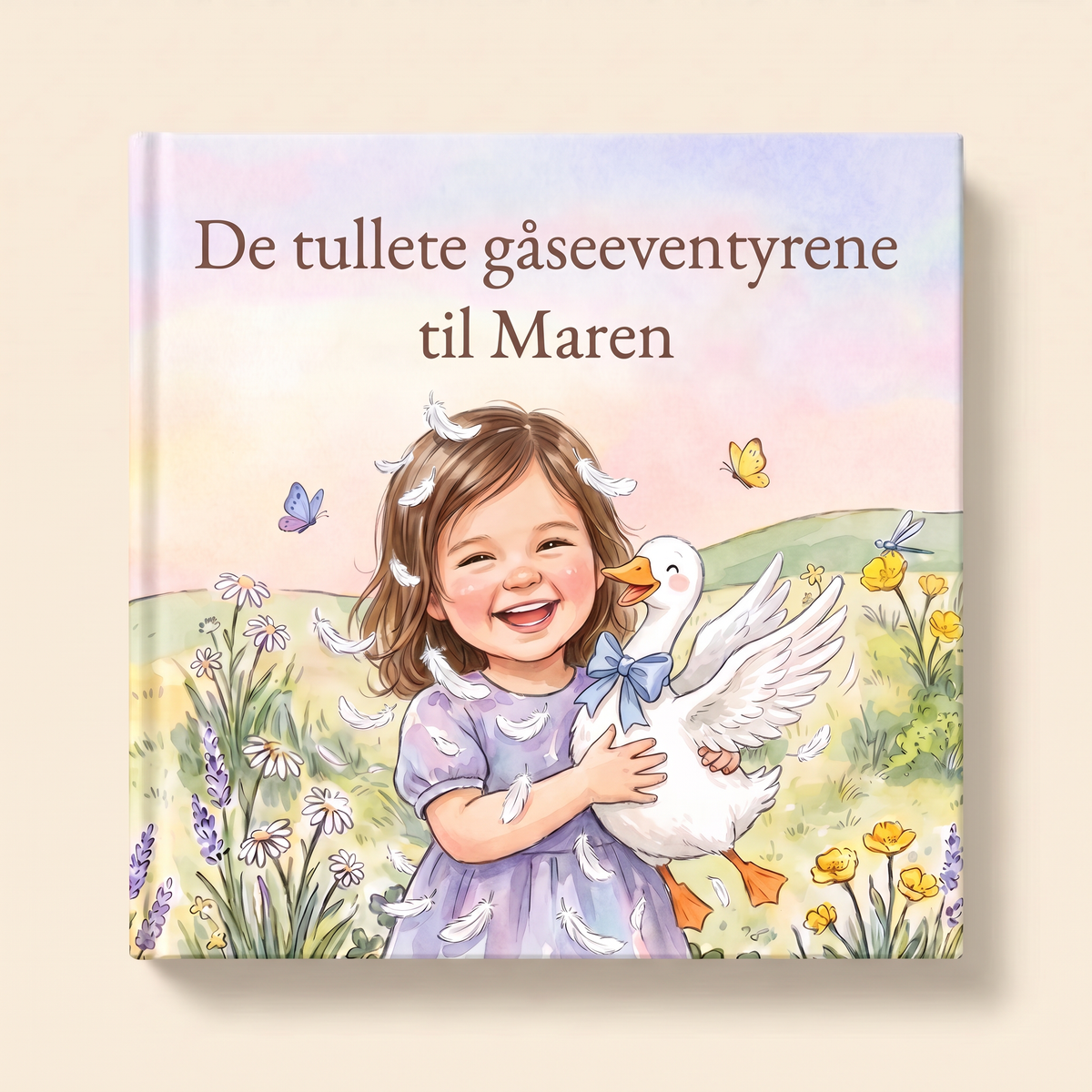 Personlig bok «De tullete gåseeventyrene til Maren» på lys, nøytral bakgrunn