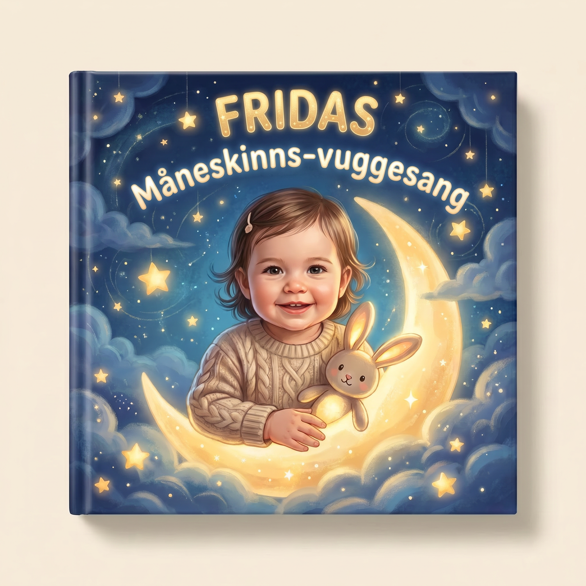 Personlig bok «Fridas Måneskinns-vuggesang» på lys, nøytral bakgrunn